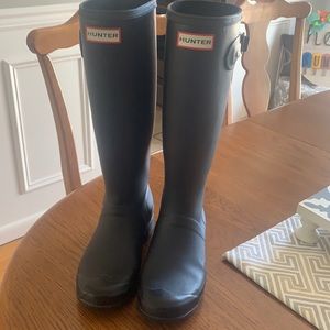 Tall matte black hunter boots